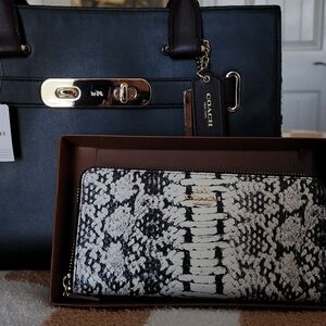 3 year old exotic coach purse
